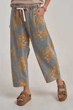 MID RISE FLORAL DENIM JEANS