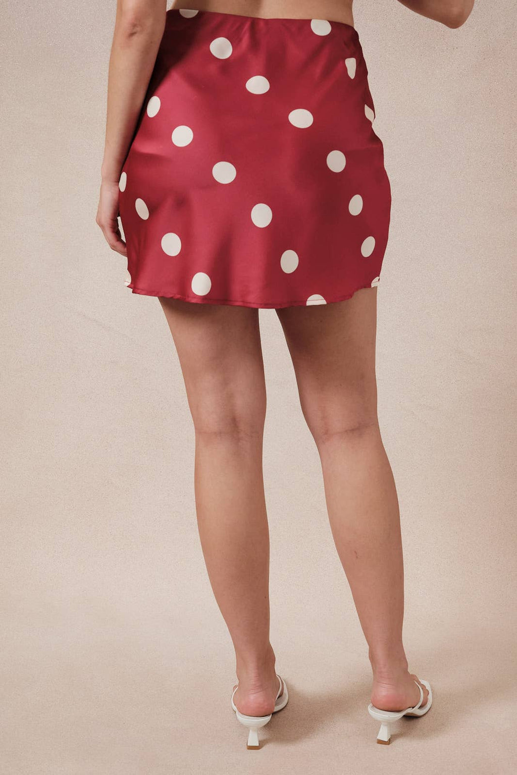 SHORT LINED SATIN BIAS MINI SKIRT