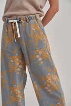 MID RISE FLORAL DENIM JEANS